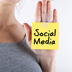 "Social Media" on a sticky note